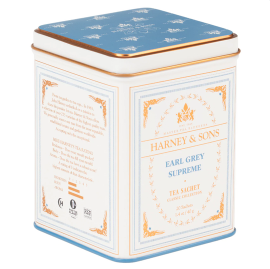 A tin of Harney & Sons earl grey supreme tea on a white background.